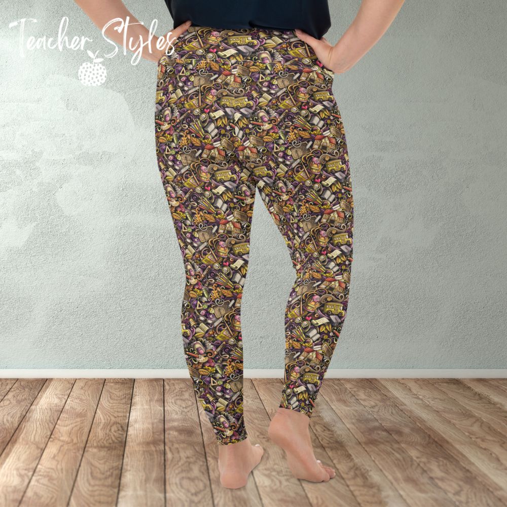 School Days Leggings by Teacher Styles. Model shown from the waist down. Leggings feature purple accents and colorful education graphics - pencils, books, bells, school buses and more! Plus size. Back view.