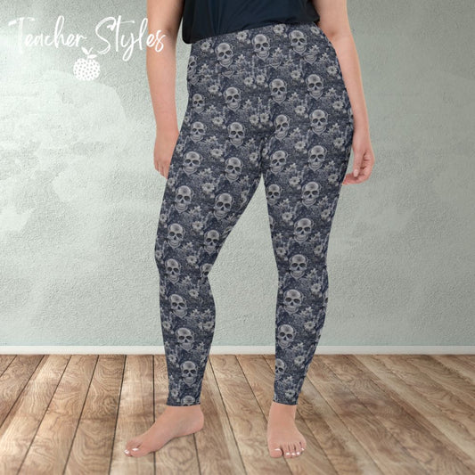 Skulls & Flora plus size leggings by Teacher Styles. Model is shown from the waist down. Leggings colors are tones of gray featuring a pattern and skulls and flowers. front view Halloween. Goth.