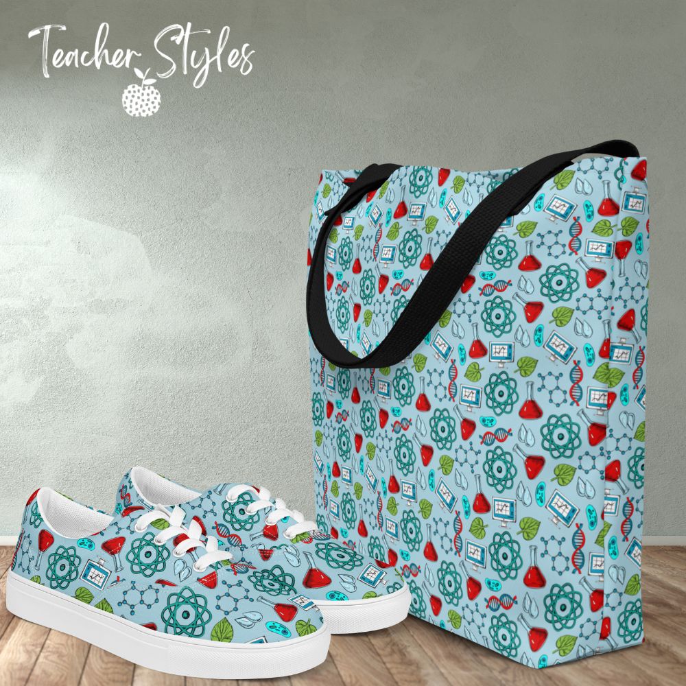 Science Tote Bag and matching lace-up shoes by Teacher Styles.  Shoes and tote feature light blue background with pattern of science graphics - atoms, beakers, DNA and more! Black canvas webbed handles on tote. Size 16" x 20". Shoes and tote on floor in room.