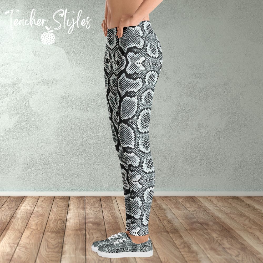 Snake Print leggings by Teacher Styles. Model is shown from the waist down. Leggings are covered in snake skin pattern in various tones of grey. Side view. Model is wearing matching snake print shoes.