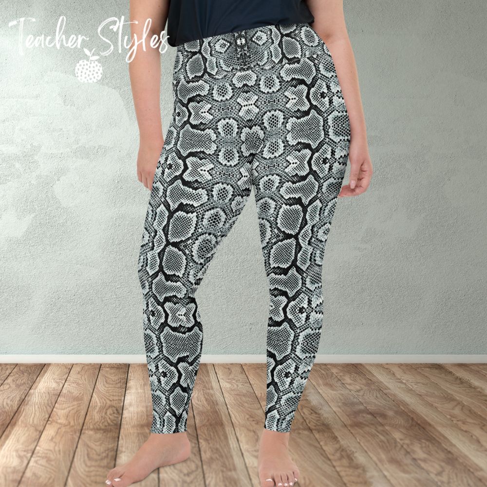 Snake Print leggings by Teacher Styles. Model is shown from the waist down. Leggings are covered in snake skin pattern in various tones of grey. Side view.