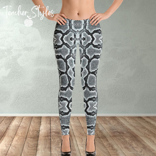 Snake Print leggings by Teacher Styles. Model is shown from the waist down. Leggings are covered in snake skin pattern in various tones of grey. Front view.