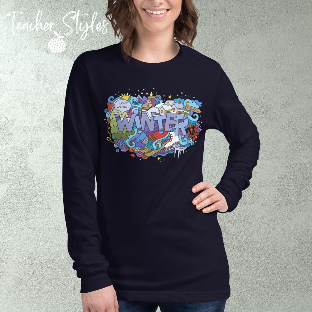 Winter Long sleeve T-shirt by Teacher Styles. Model is shown from the waist up. Navy blue tshirt with the word Winter in block letters surrounded by winter doodle of snow and skates and more!